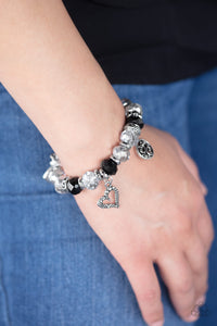 "Paparazzi" Fabulously Flirty -Black Bracelet